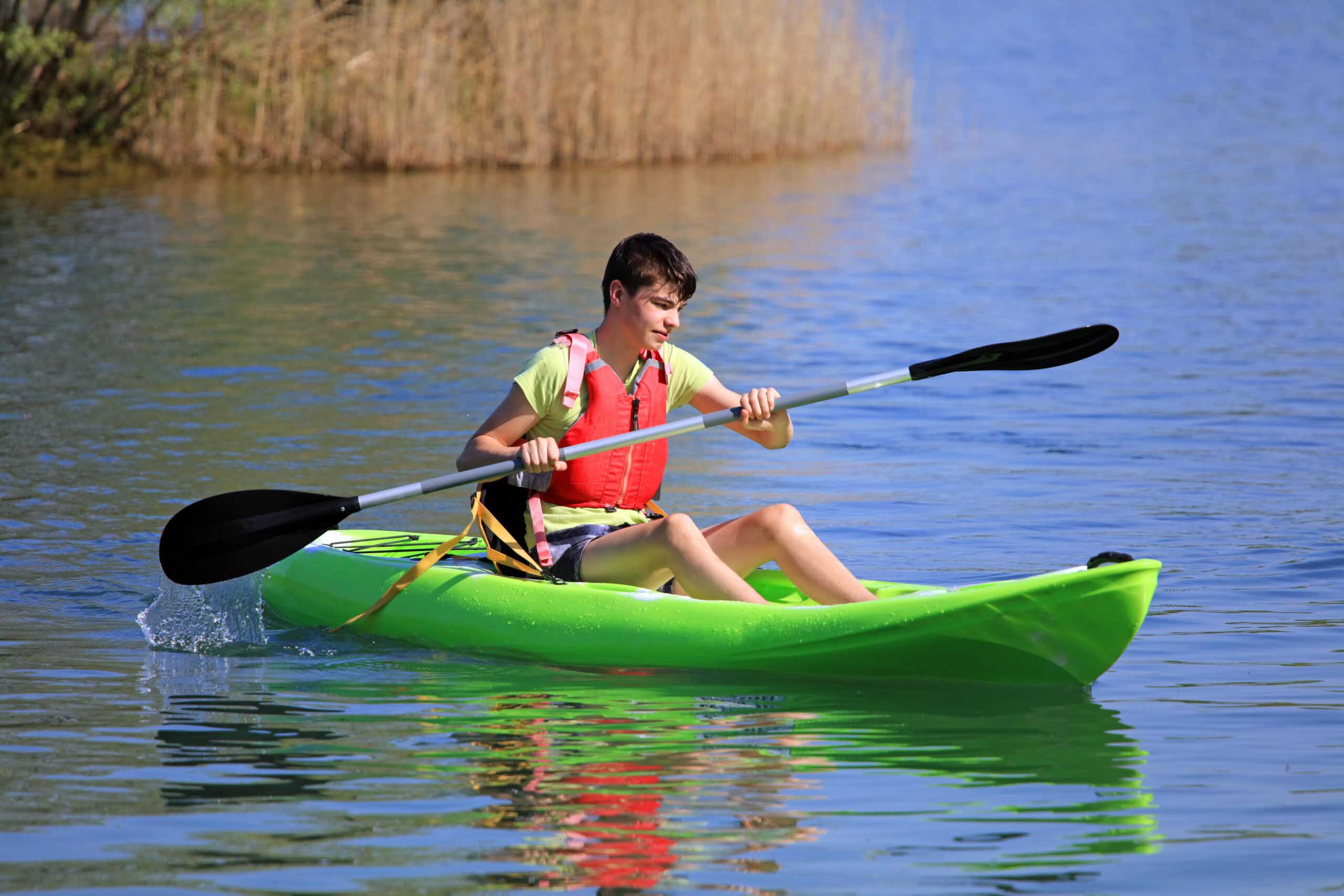 Kayaking on a lake at the Cotswold Water Park