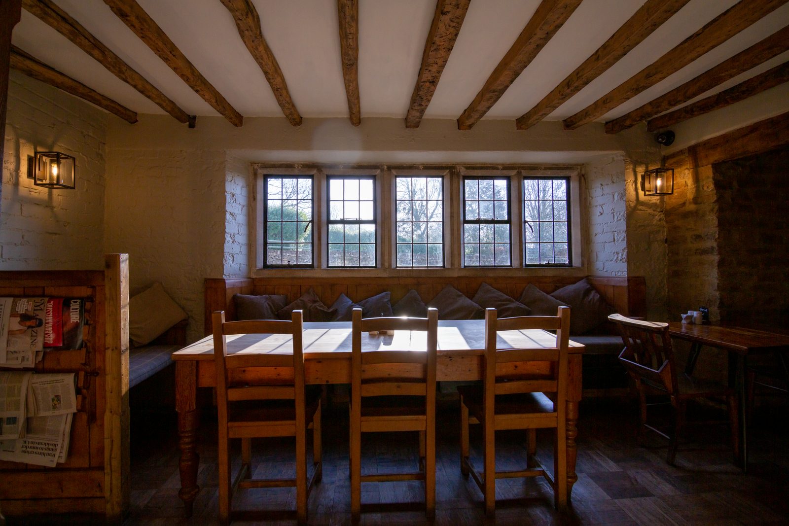 Dining tables beneath the beams