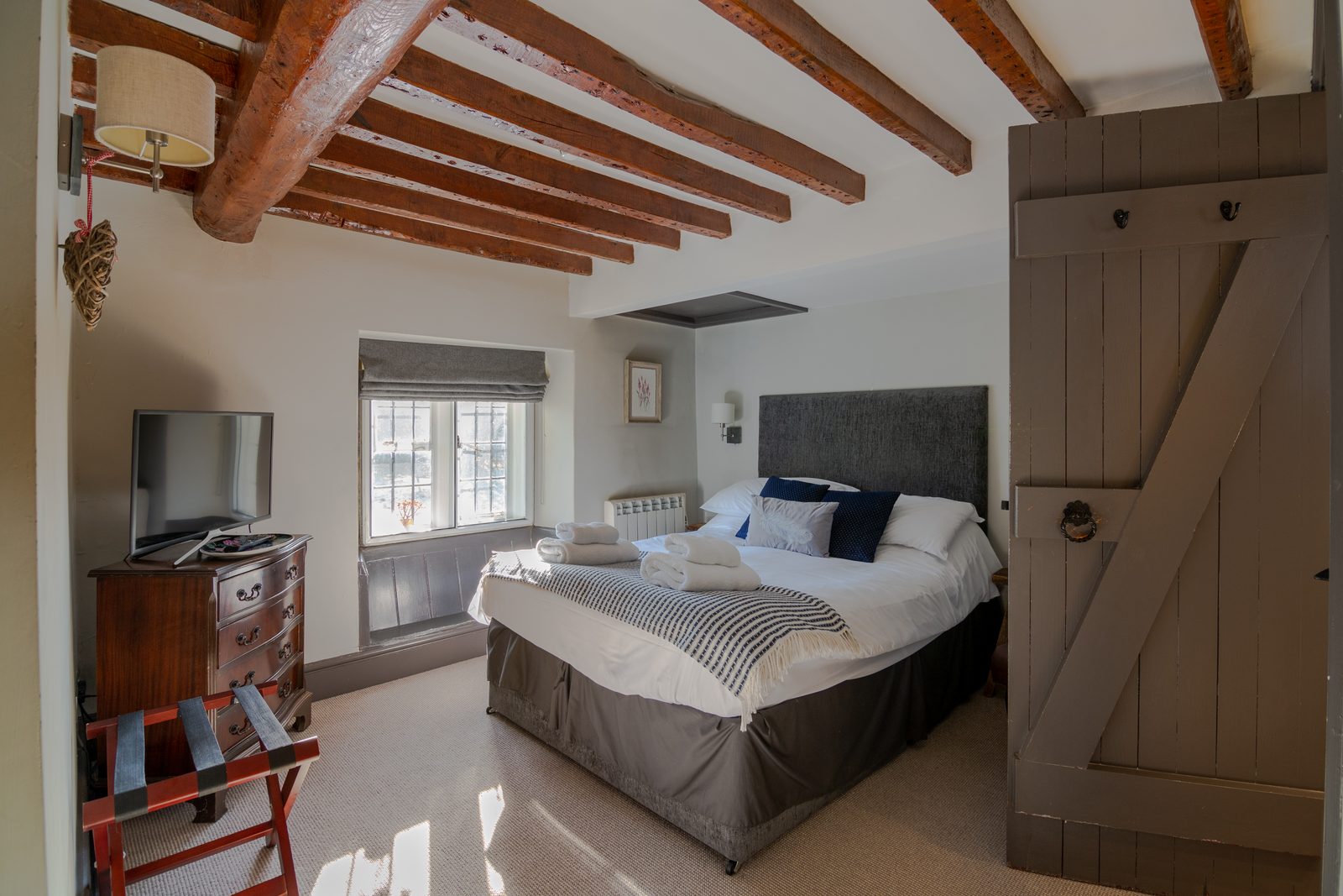 Double room with exposed beams
