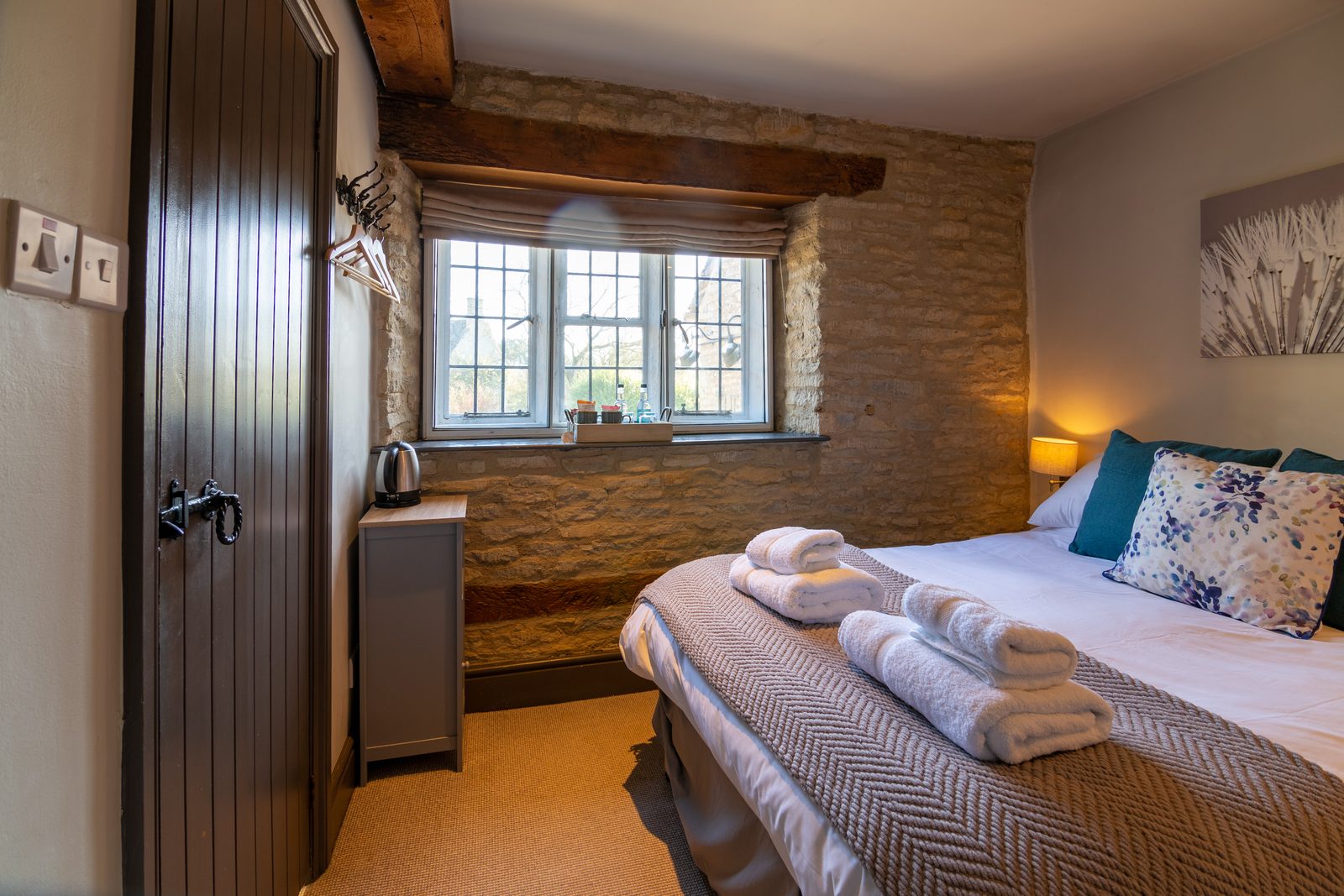 Double room with Cotswold stone walls